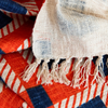 Marli Cotton Slub Throw in Burnt Orange and Navy