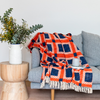 Marli Cotton Slub Throw in Burnt Orange and Navy